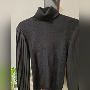 SIZE XS. White House Black Market Black Turtleneck with bell sleeves.